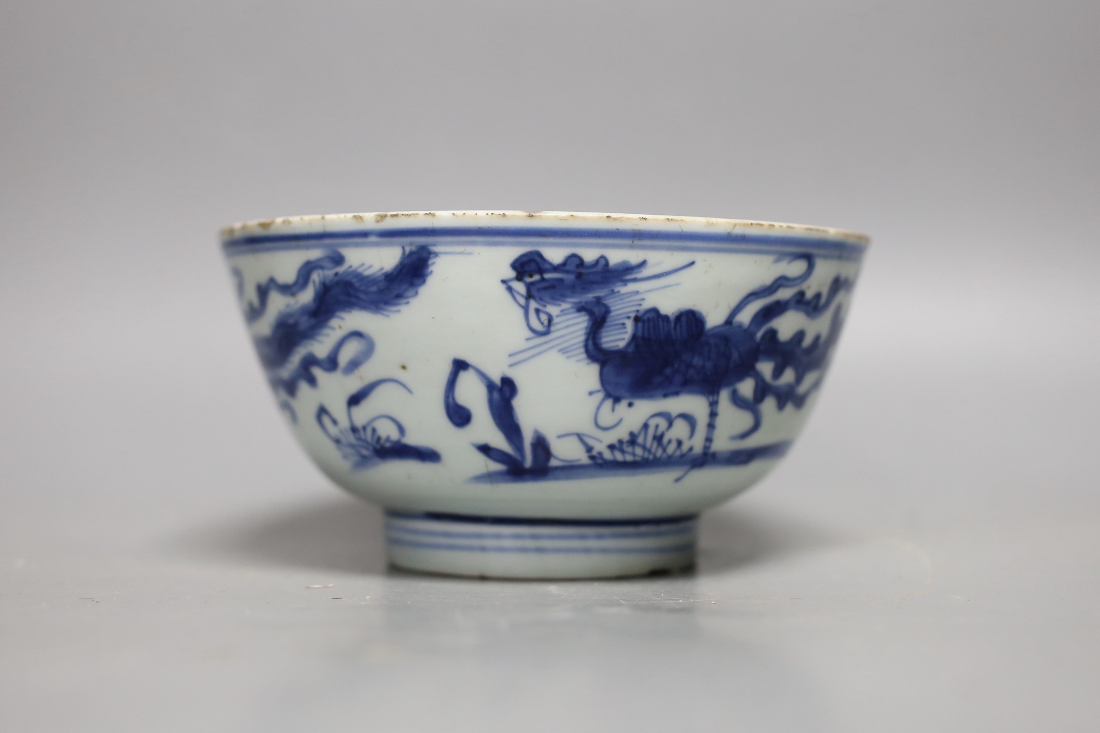 A Chinese blue and white ‘phoenix’ deep bowl, 17th century, 15.5cm